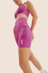 BERMUDA DE COMPRESSÃO LIVRE COM MULTIBOLSOS 5+ FlexSkin™ MAGENTA