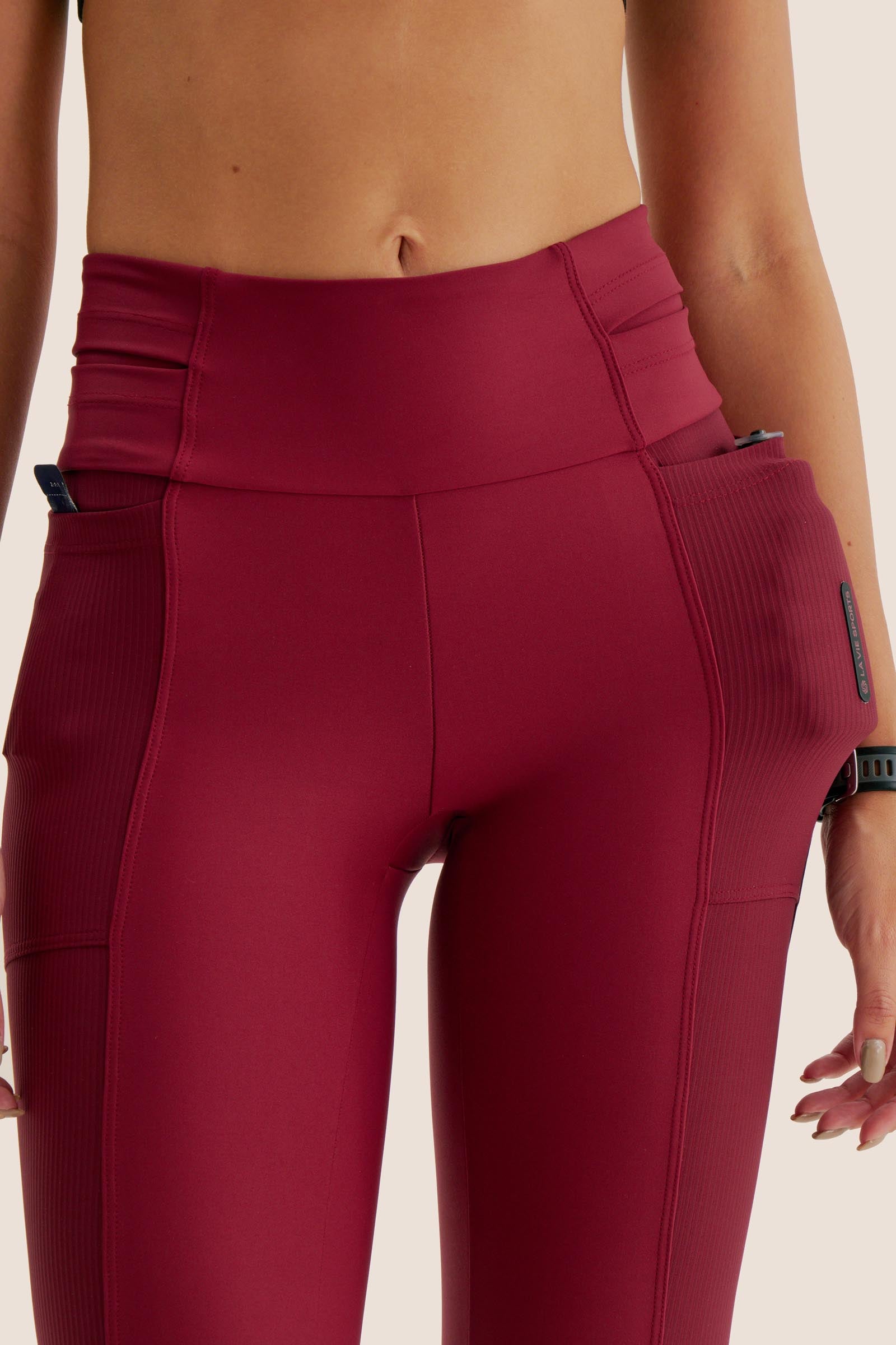 CALÇA DE COMPRESSÃO COM MULTIBOLSOS FlexSkin™ BETERRABA