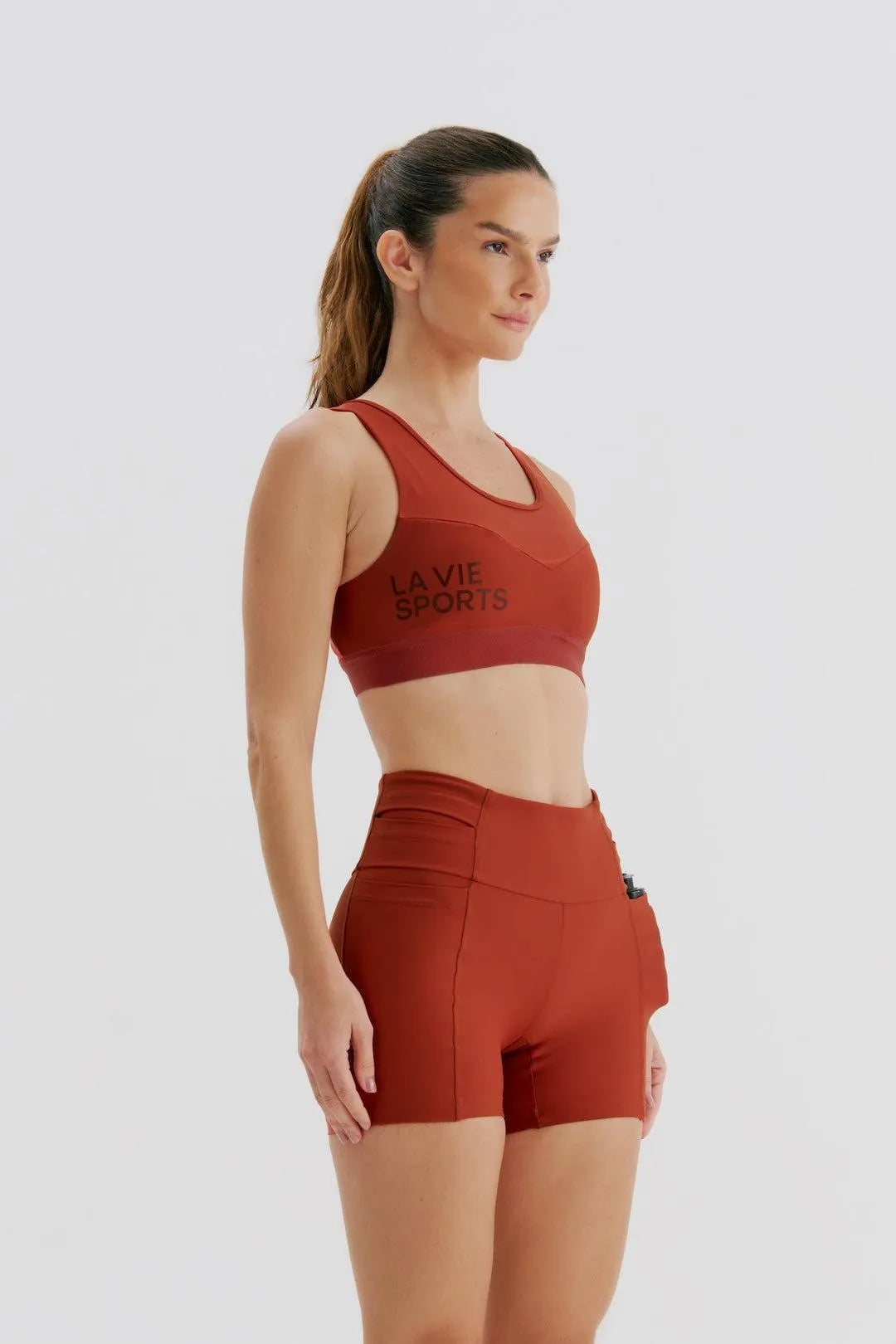 Short de Compressão Curto com Multibolsos Total Emana Cobre