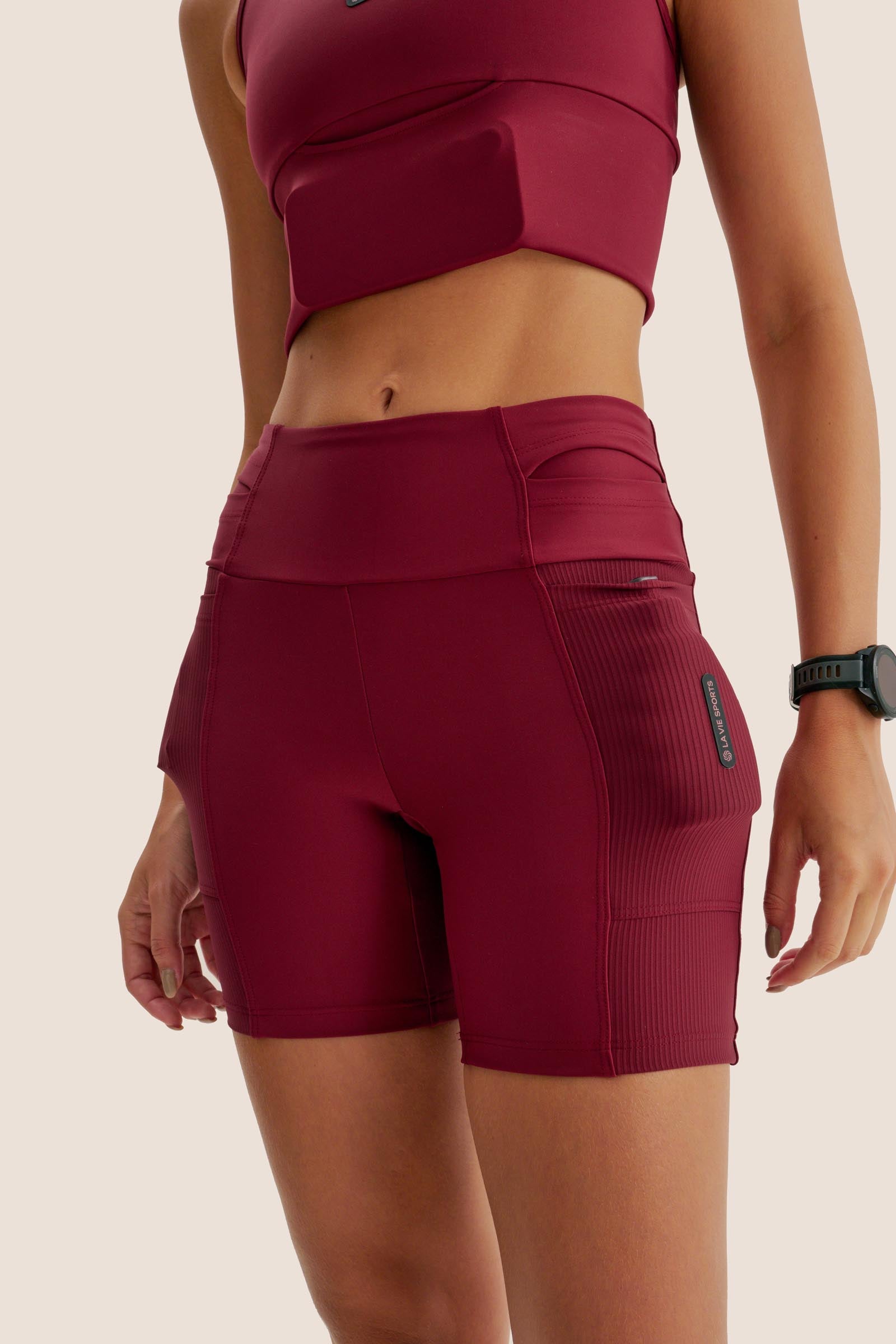 SHORT DE COMPRESSÃO COM MULTIBOLSOS FlexSkin™ BETERRABA