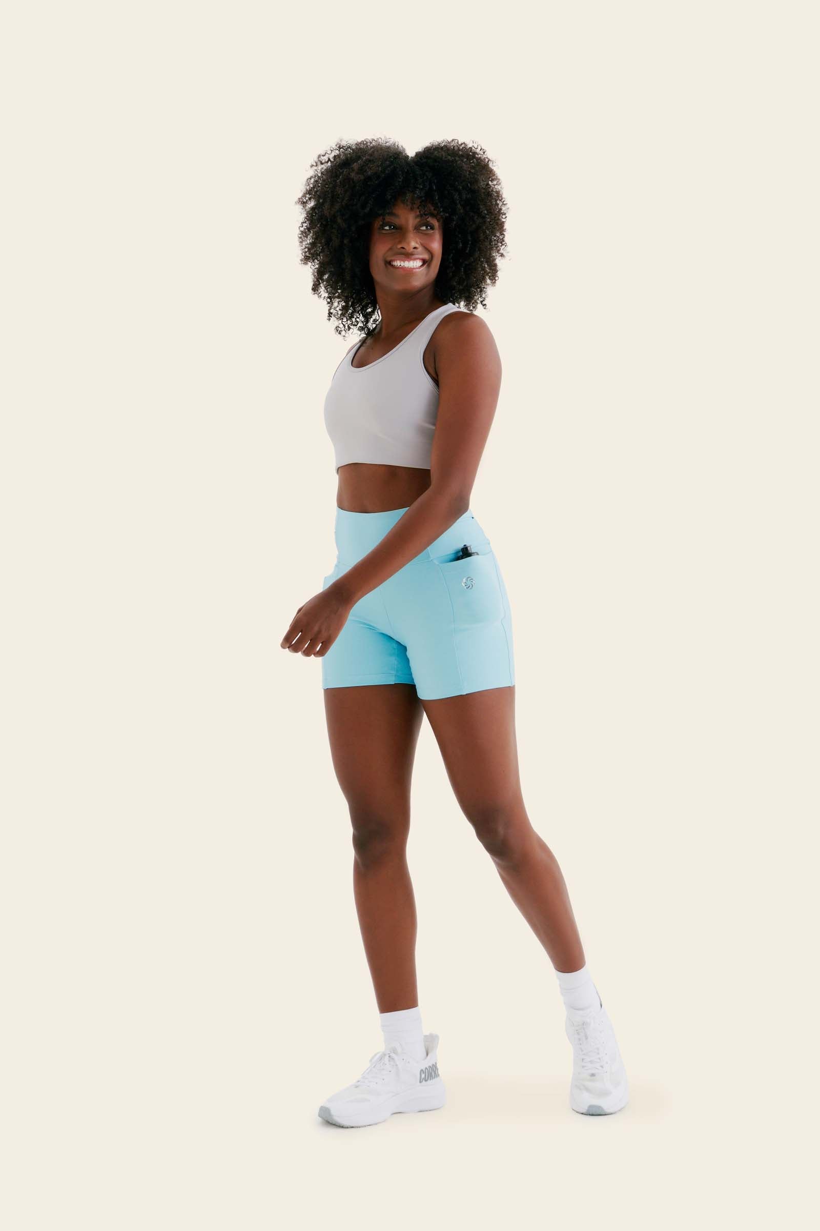 SHORT DE COMPRESSÃO COM MULTIBOLSOS CURTO TOTAL EMANA BRISA