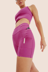 SHORT DE COMPRESSÃO COM MULTIBOLSOS FlexSkin™ MAGENTA
