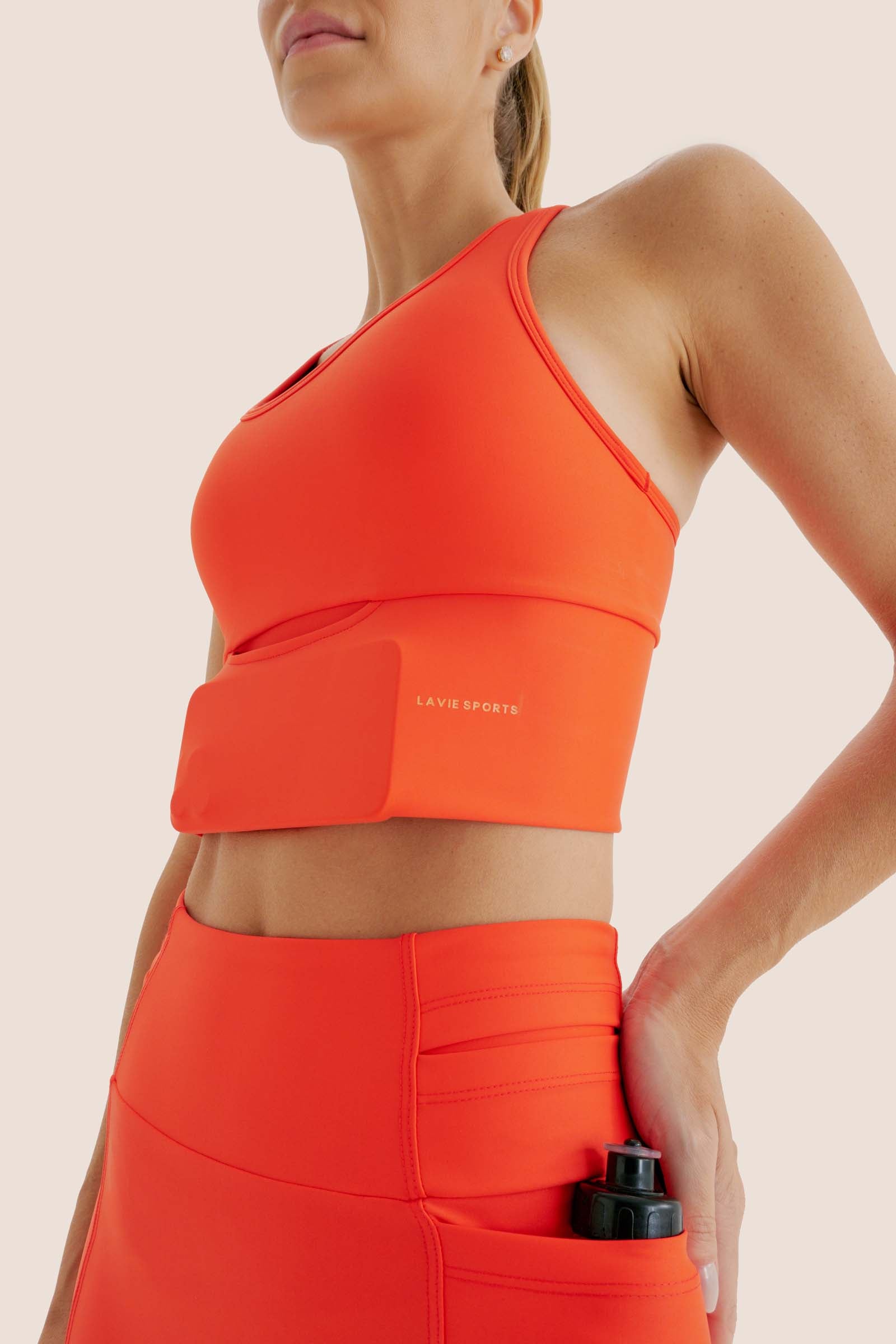 TOP DE COMPRESSÃO MULTIBOLSOS FlexSkin™ GUARÁ