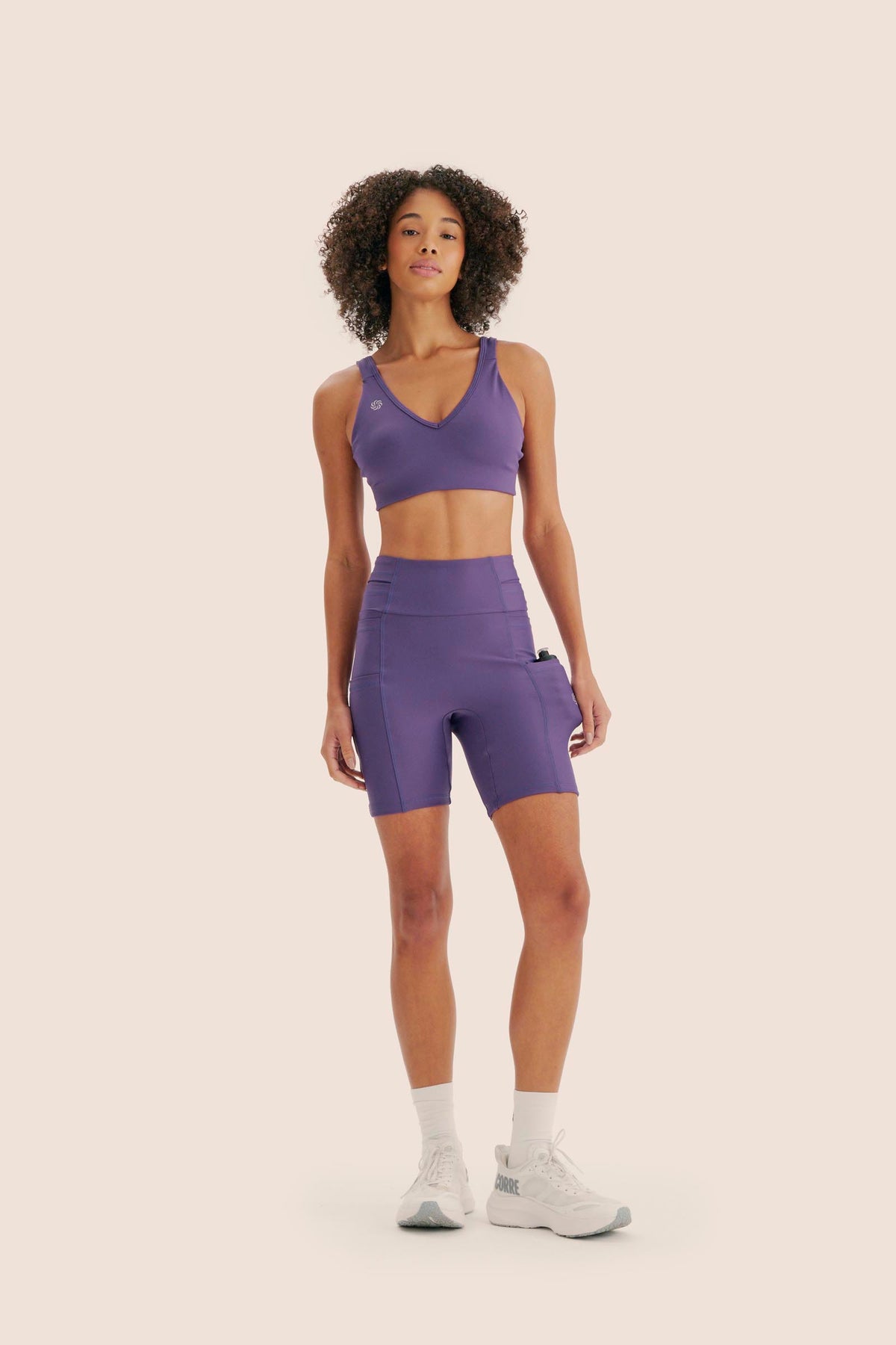 BERMUDA DE COMPRESSÃO LIVRE MULTIBOLSOS 5+ FlexSkin™ AÇAÍ