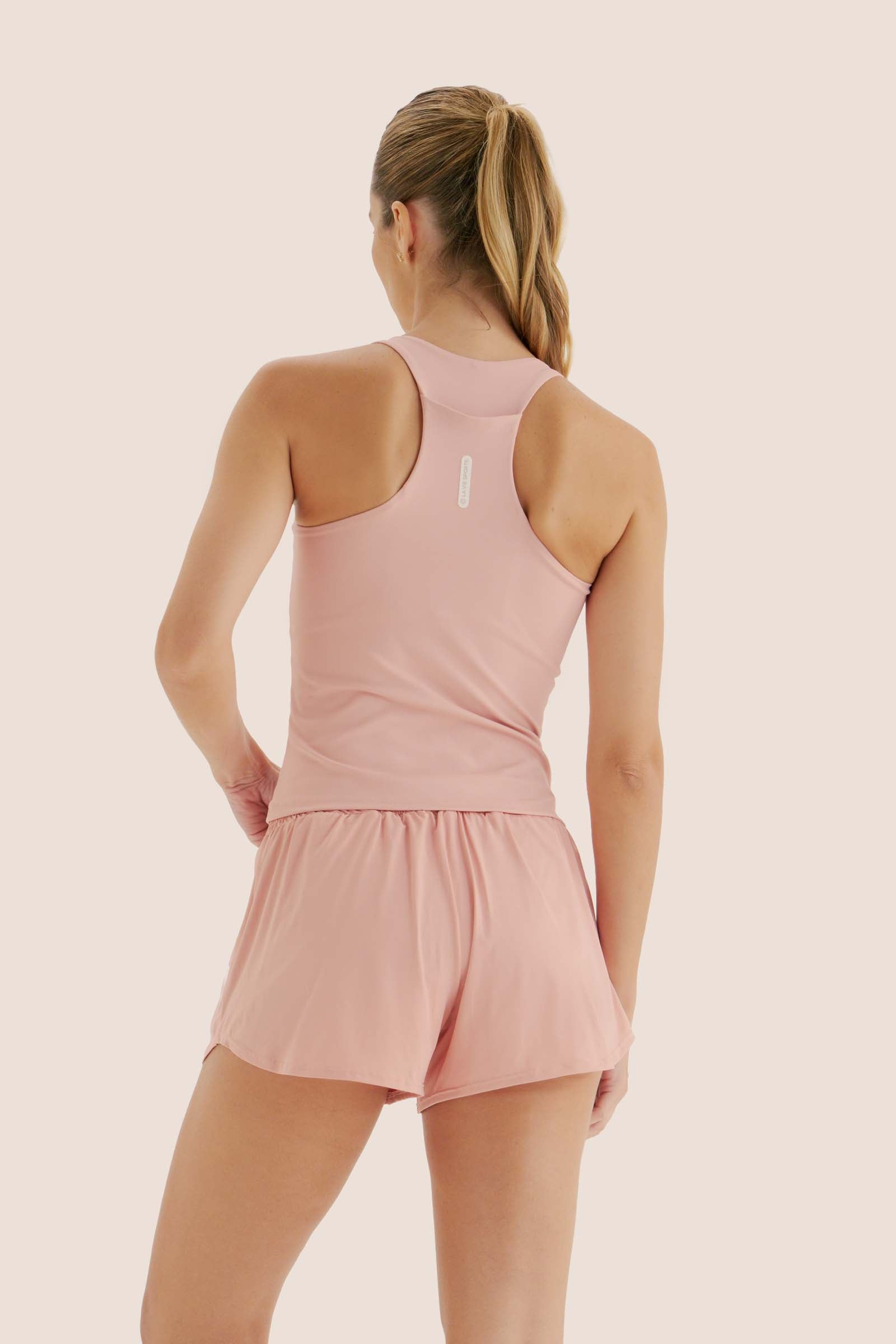 CAMISETA DE COMPRESSÃO COM SUPER BOLSO ROSE