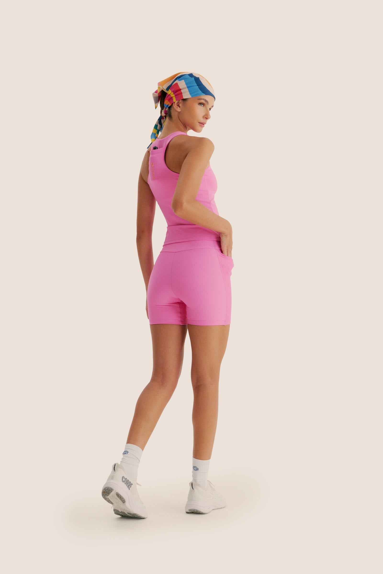 CAMISETA DE COMPRESSÃO COM SUPER BOLSO ROSA