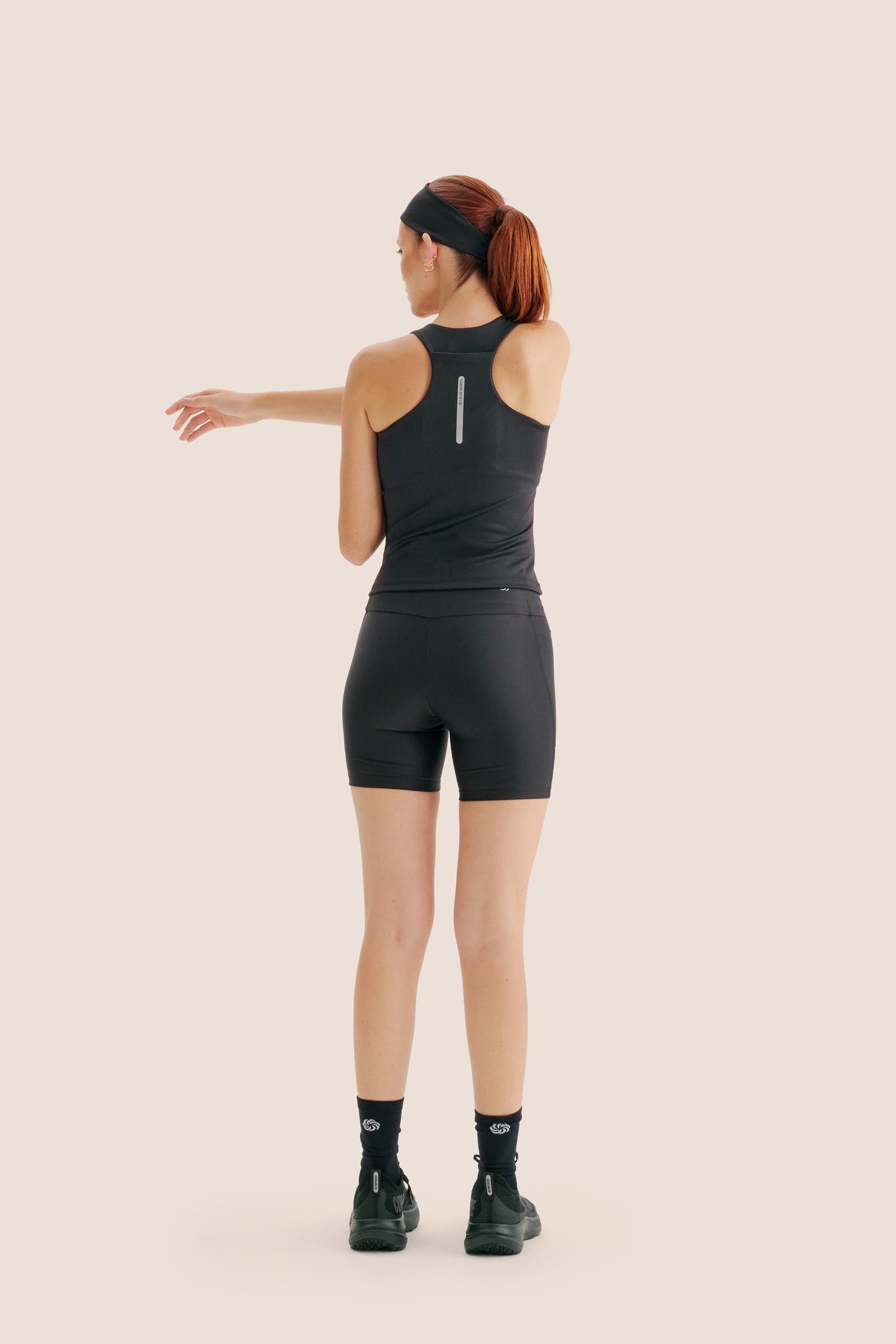 SHORT DE COMPRESSÃO COM MULTIBOLSOS FlexSkin™ PRETO