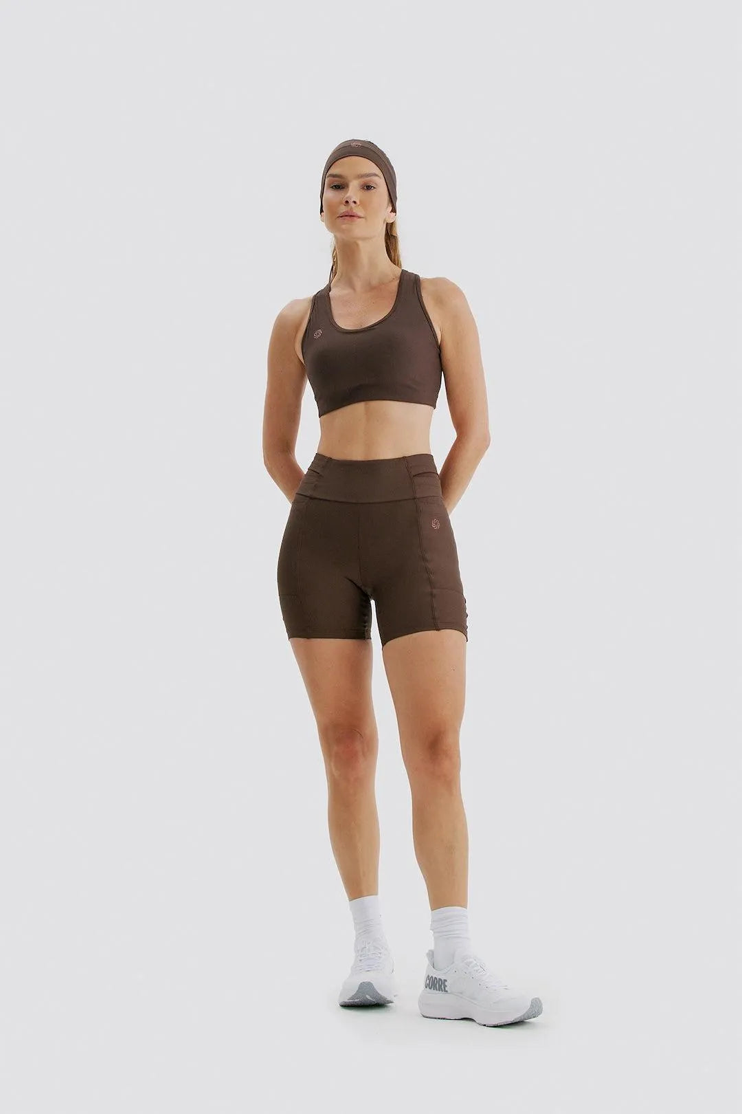 Short de compressão com Multibolsos Raiz