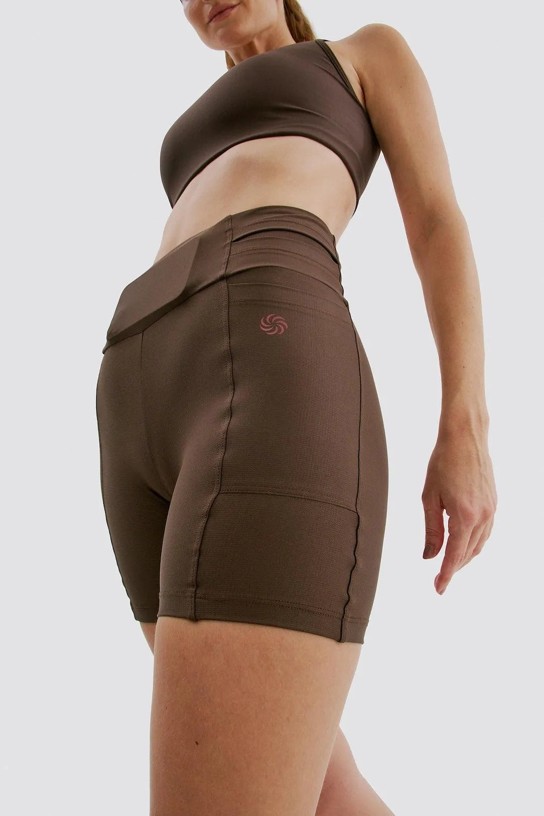 Short de compressão com Multibolsos Raiz