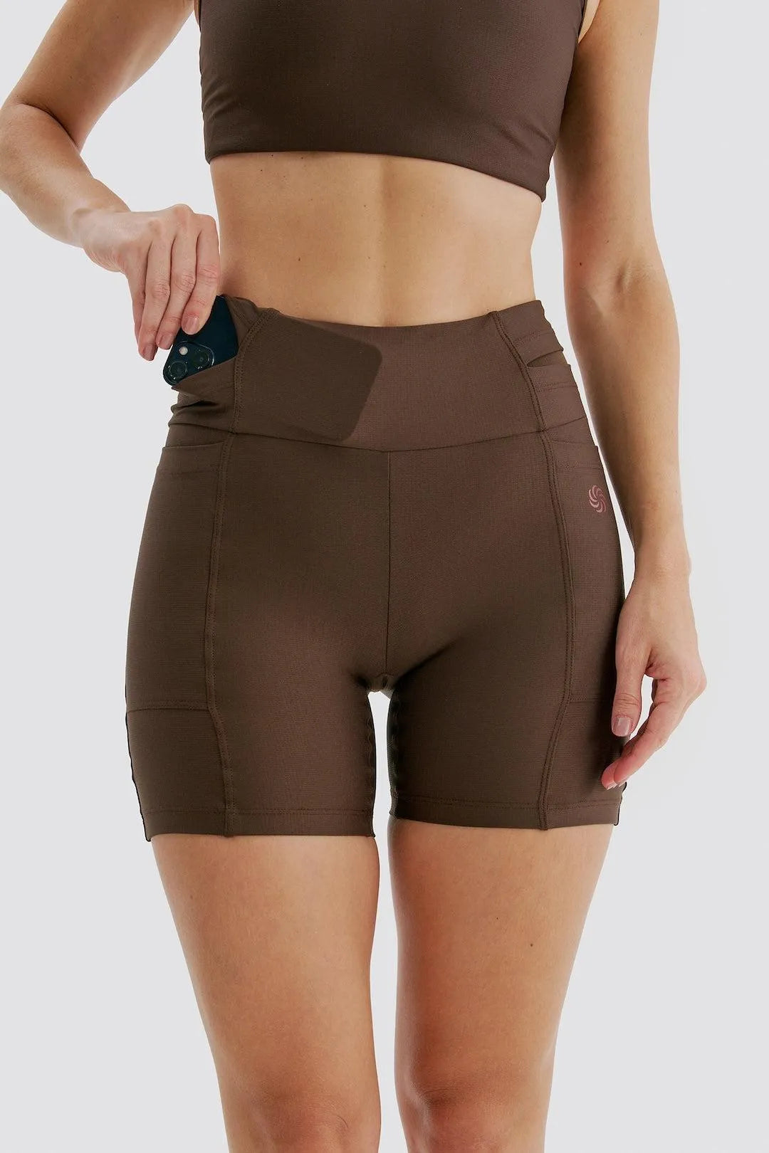 Short de compressão com Multibolsos Raiz