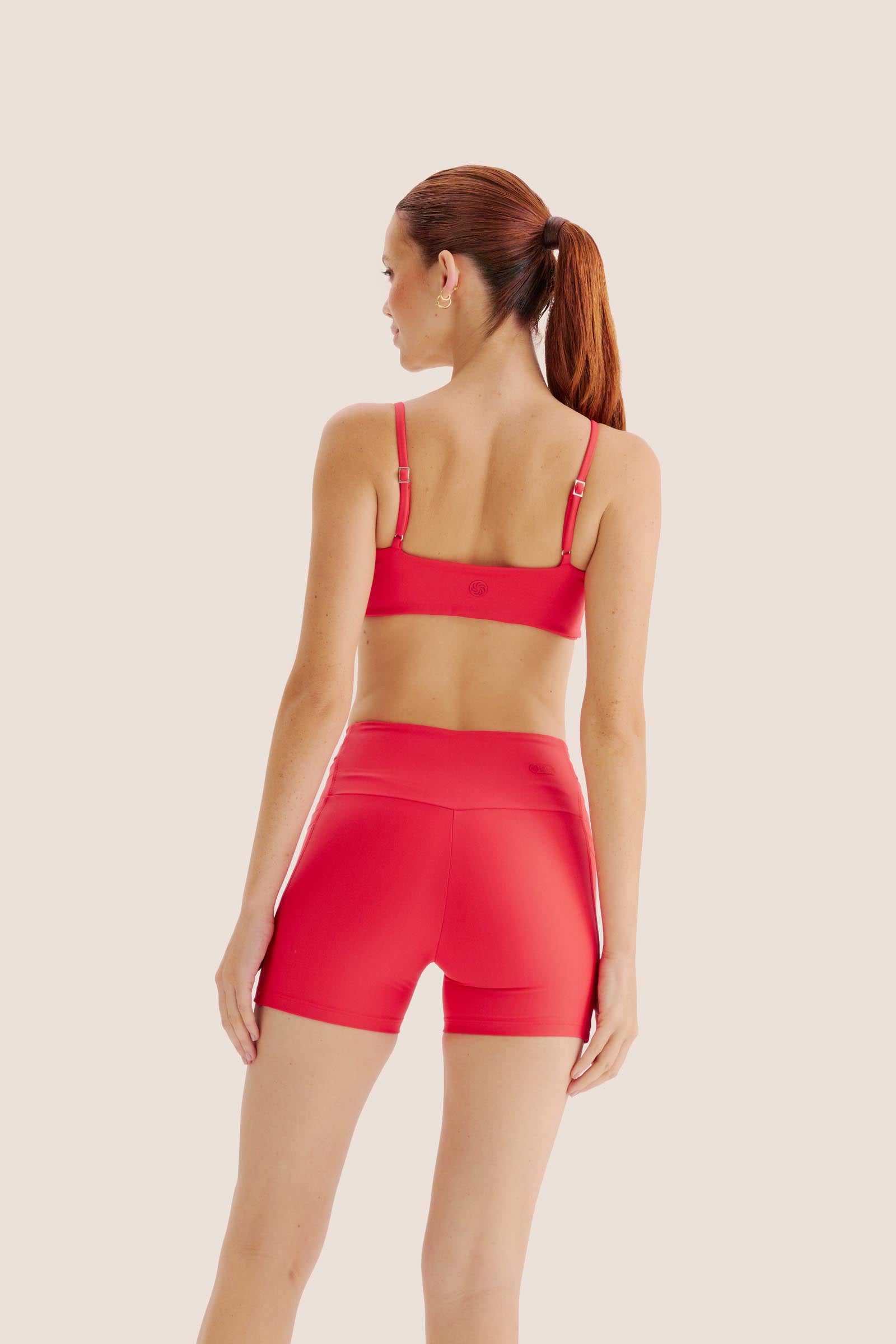 SHORT DE COMPRESSÃO COM MULTIBOLSOS CURTO EMANA FOGO
