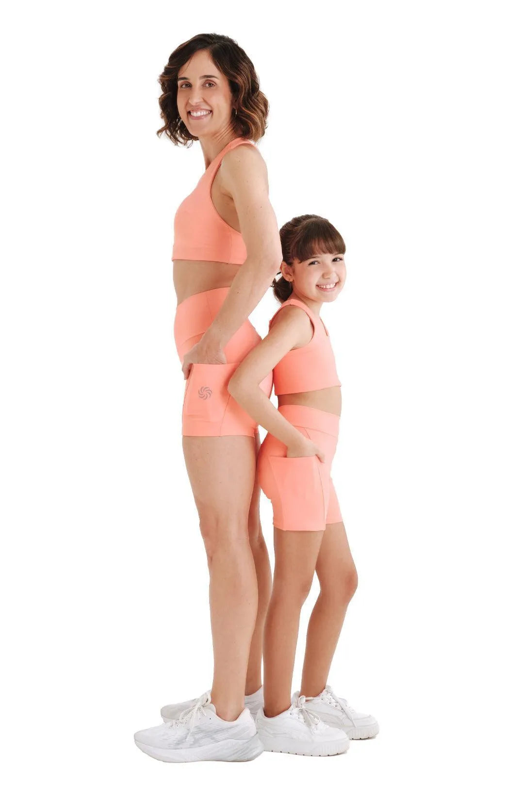 Top de compressão com bolso infantil total emana coral