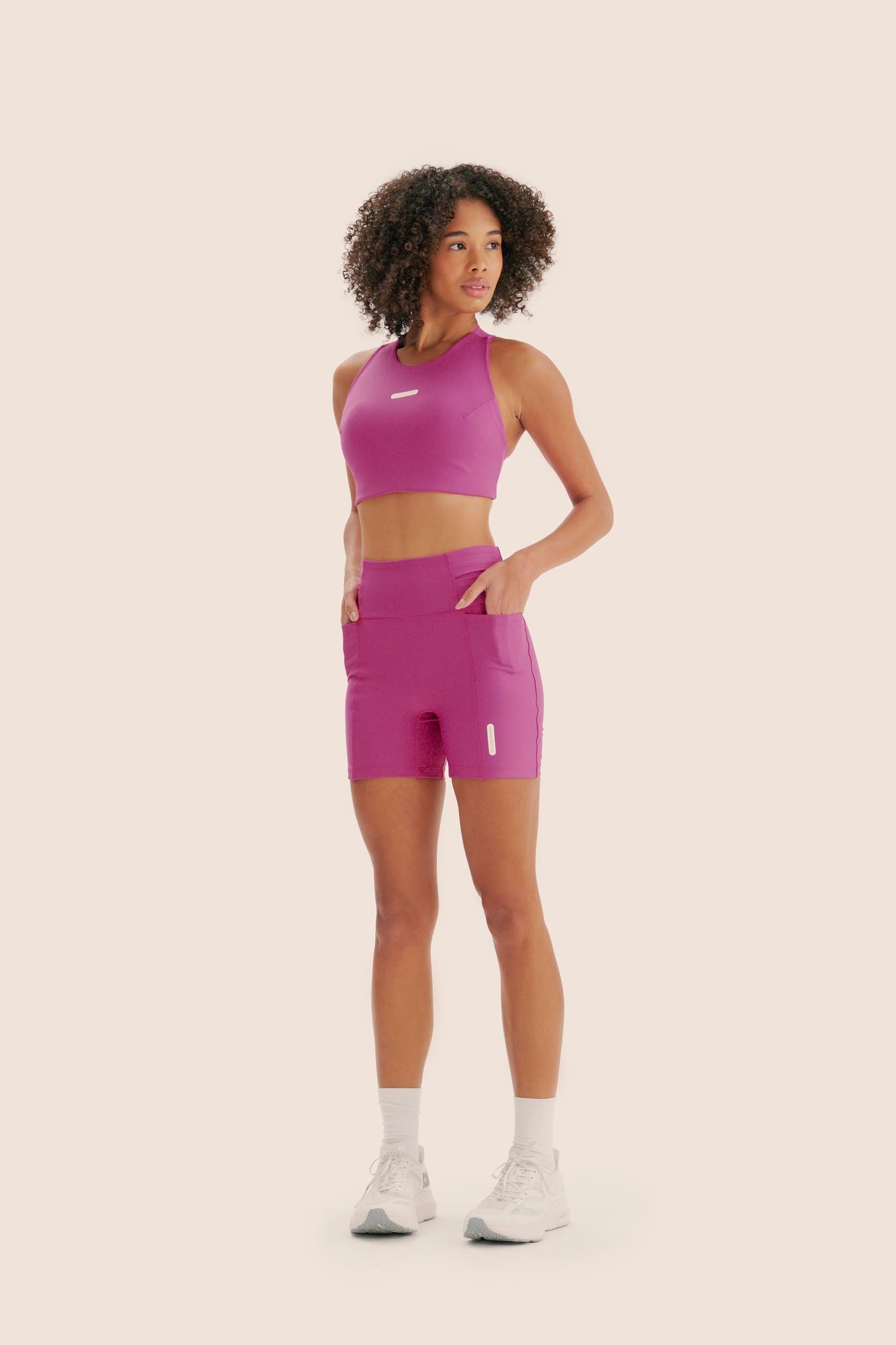 TOP DE COMPRESSÃO COM BOLSO CROPPED BOJO FIXO 2.0 FlexSkin™ MAGENTA