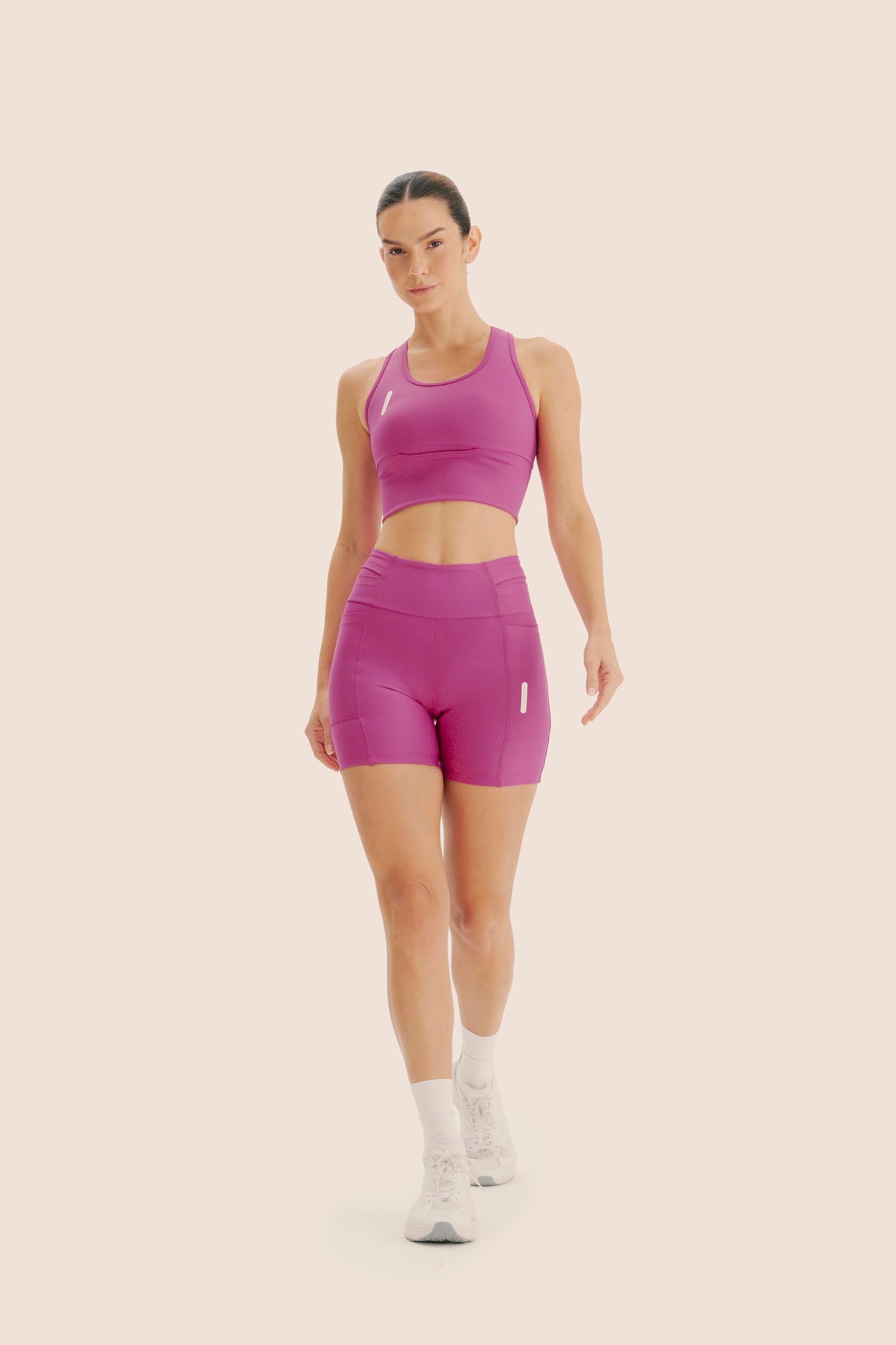 TOP DE COMPRESSÃO MULTIBOLSOS FlexSkin™ MAGENTA