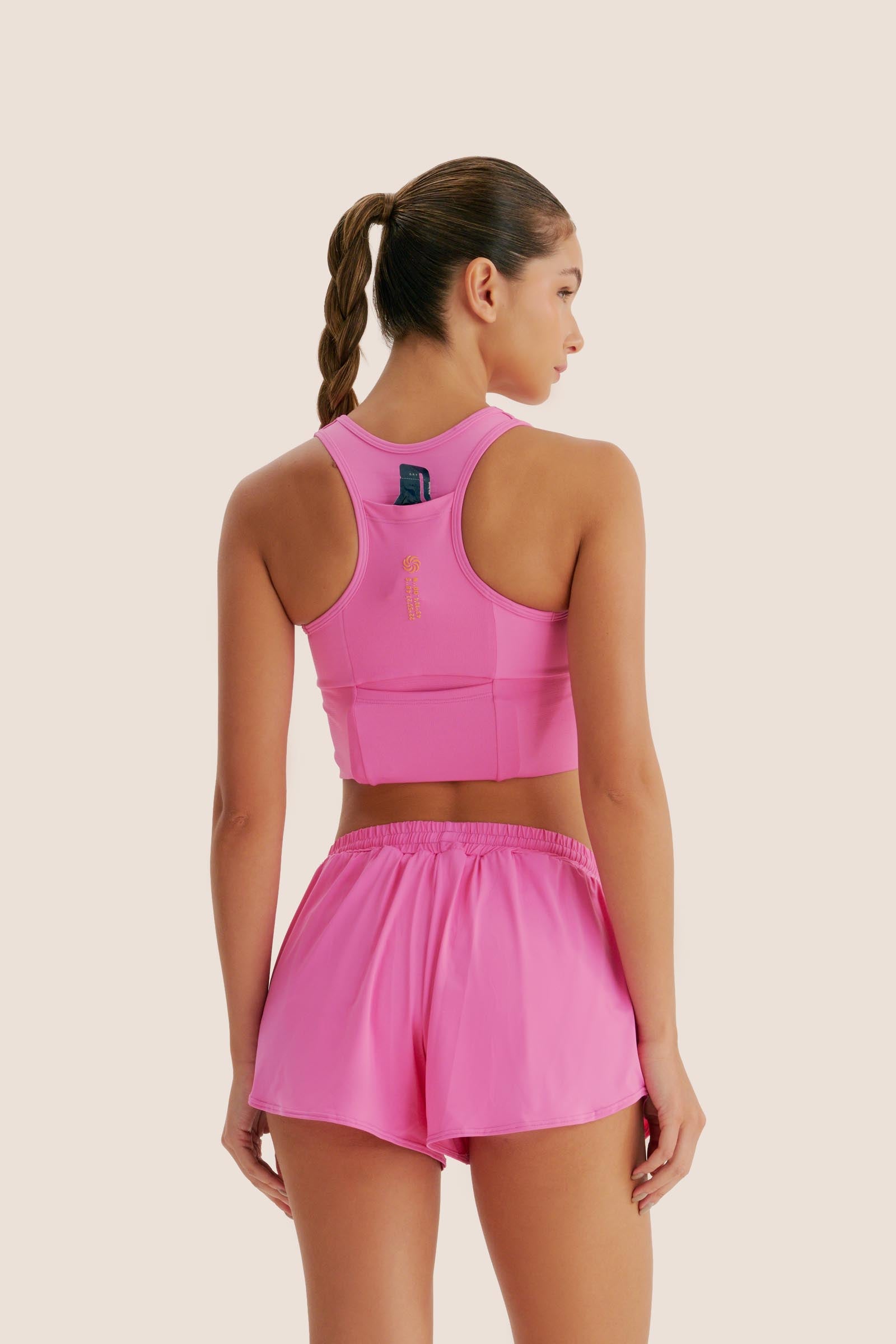 TOP DE COMPRESSÃO MULTIBOLSOS ROSA