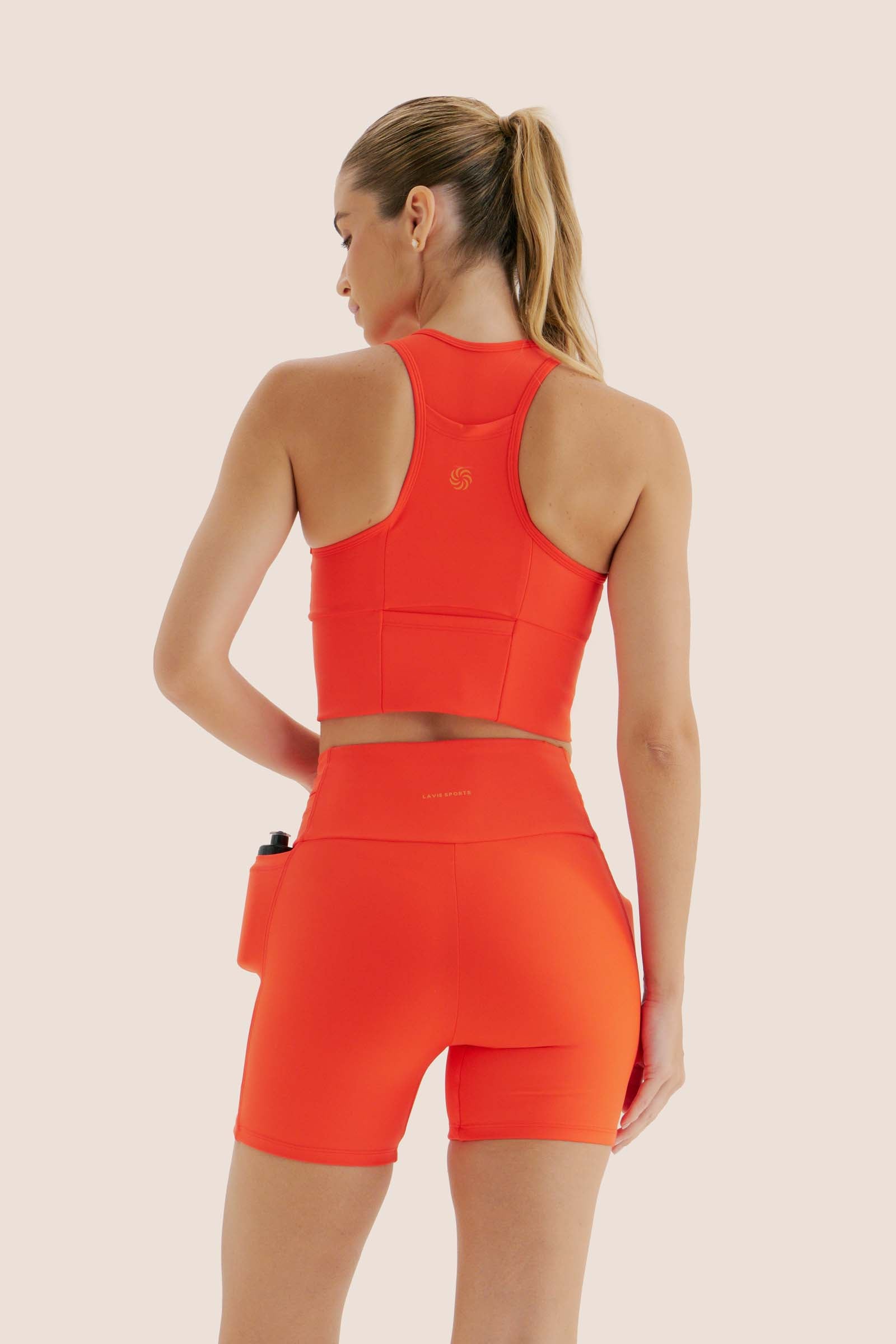 TOP DE COMPRESSÃO MULTIBOLSOS FlexSkin™ GUARÁ