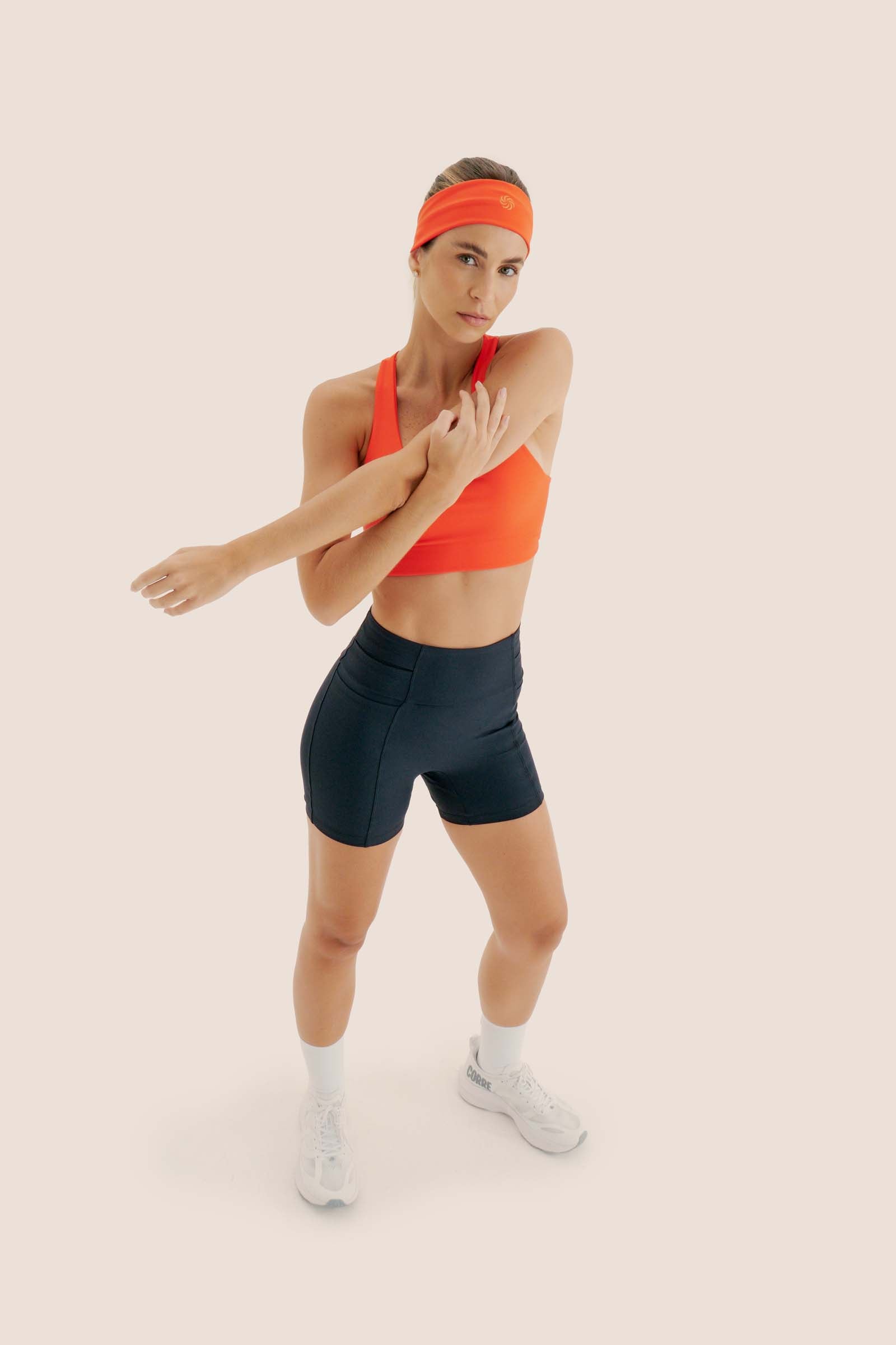 TOP DE COMPRESSÃO COM SUPER BOLSO ZERO ATRITO FlexSkin™ GUARÁ