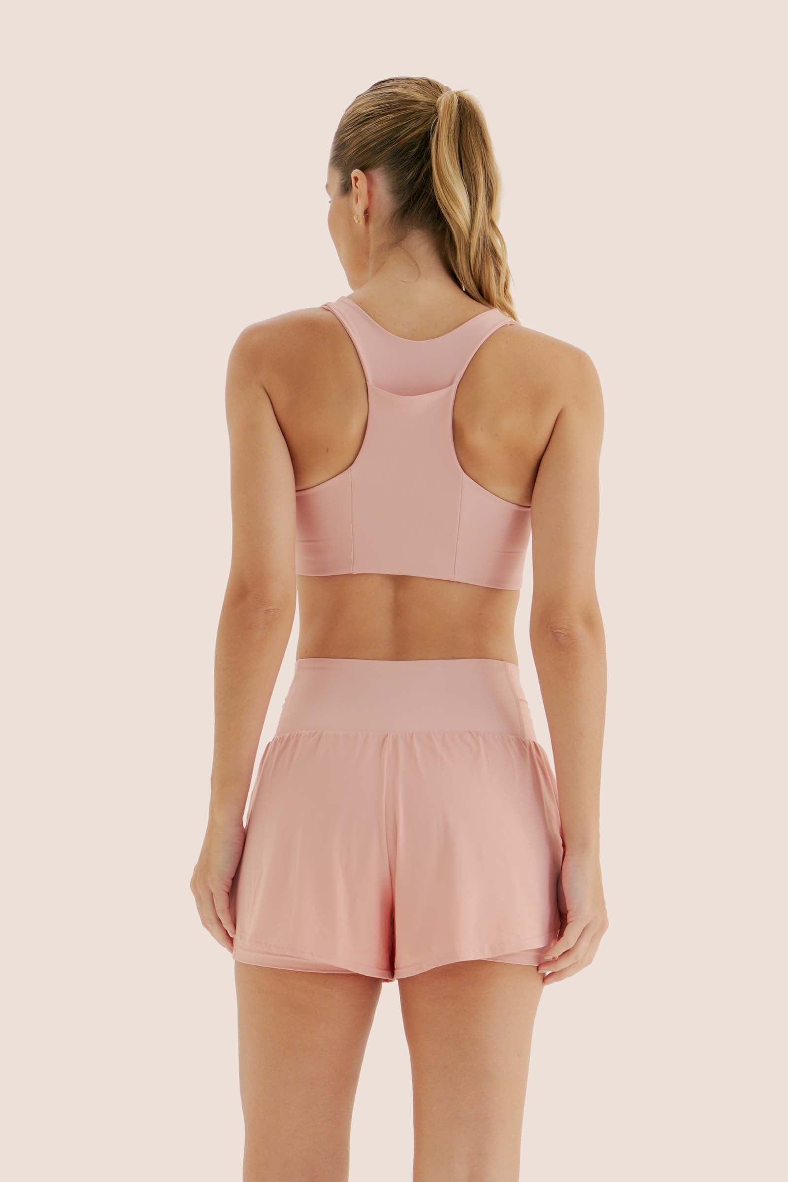 TOP DE COMPRESSÃO COM SUPER BOLSO ZERO ATRITO ROSE