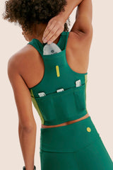 TOP DE COMPRESSÃO 7 BOLSOS FlexSkin™ ESMERALDA